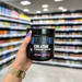 Close-up of Animal Creatine Chews 120 Tablets) held up inside My Supplement Shop, clearly showing the front label in a Sports Nutrition setting.